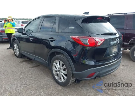 2013 Mazda Cx-5 Grand Touring z USA, uszkodzony, nr VIN JM3KE4DE8D0102702